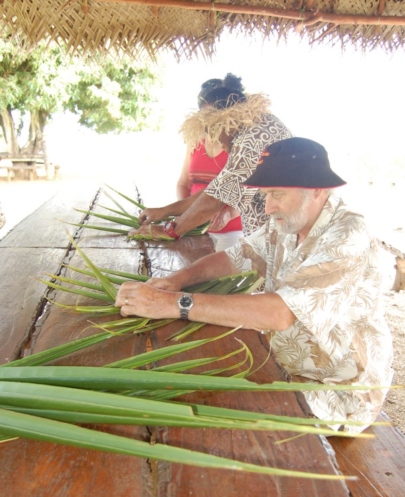 Making woven palm leaf bowls at Punarei on Aitutaki, under Ngaa's guidance. 
